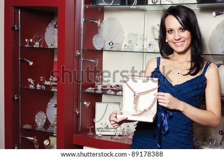 Portrait of young woman sales assistant
