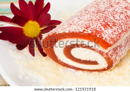 red sweet dessert with flower in a plate