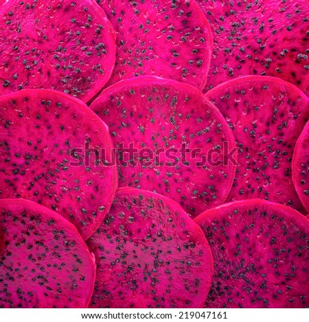 beautiful fresh sliced red dragon fruit  as background, Pitaya is the plant in Cactaceae family or Cactus, closeup
