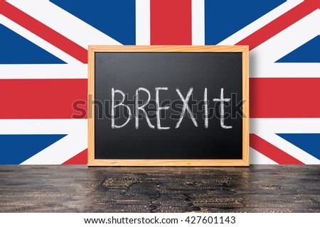 June 23: Brexit UK EU referendum concept with flag and handwriting text written in chalkboard on black craquelure background, close up