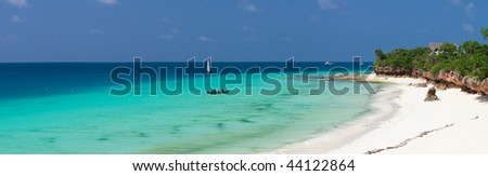 Beautiful landscape of white sand tropical beach on north-west coast of Zanzibar island