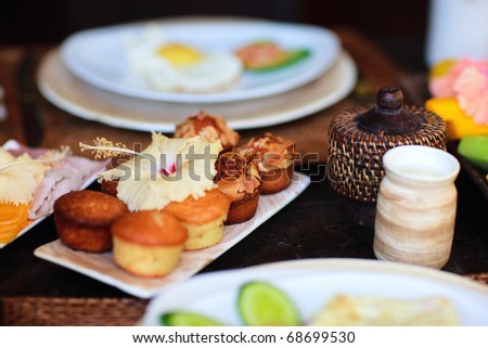 Freshly baked pastries, fried eggs, yoghurt and cold meats served for breakfast