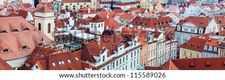 Panoramic photo of red roofs of Prague in Czech republic