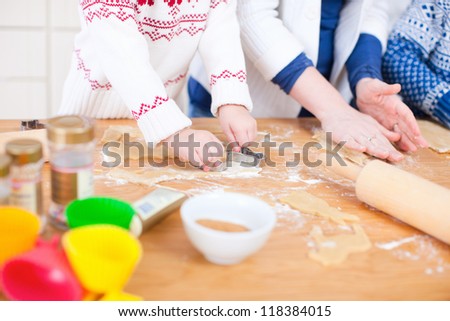 Close up of a family baking cookies