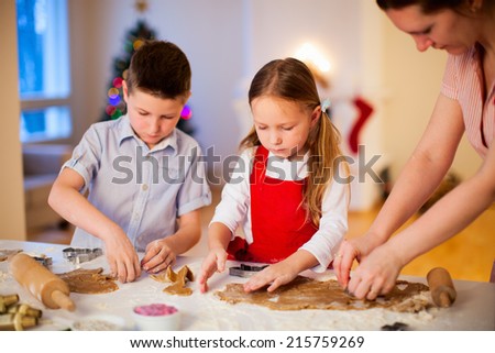 Family baking Christmas cookies at home