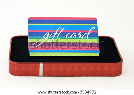 Gift card displayed in a gift box isolated on a white background