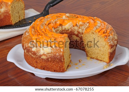 Sliced pumpkin cake on a cake platter