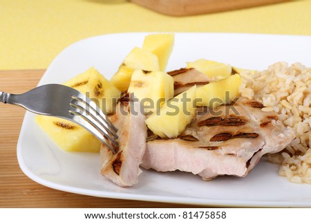 Grilled pork loin and pineapple with rice