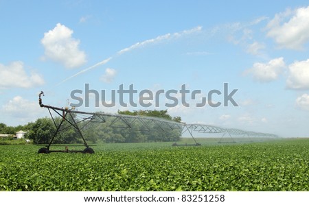 Irrigating a farm field of soybeans