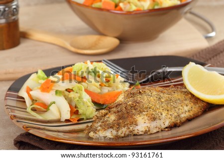 Catfish fillet meal with a slice of lemon