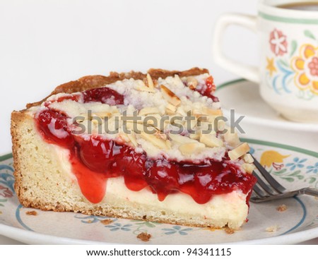 Closeup of a slice of cherry cream cheese coffee cake