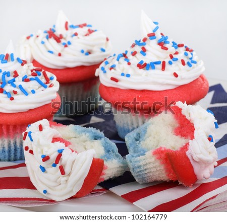 Red white and blue cupcakes with white background