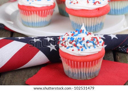 4th of july cupcake on a napkin with american flag