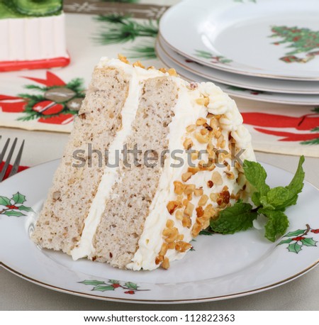 Slice of holiday cake on a christmas plate