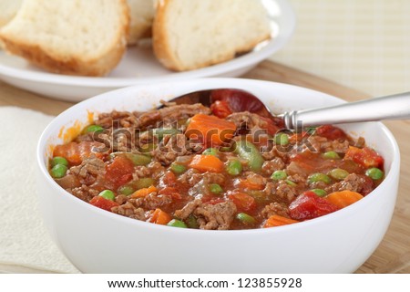 Bowl of vegetable soup with ground beef