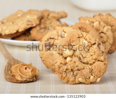 Peanut butter cookies with a spoon of peanut butter