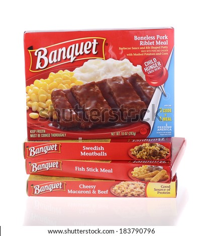 PETERSBURG,ILLINOIS-MARCH 5, 2014:  Banquet frozen dinners on a white background. Banquet Foods is a subsidiary of ConAgra Foods which sells frozen entrees, meals and desserts.