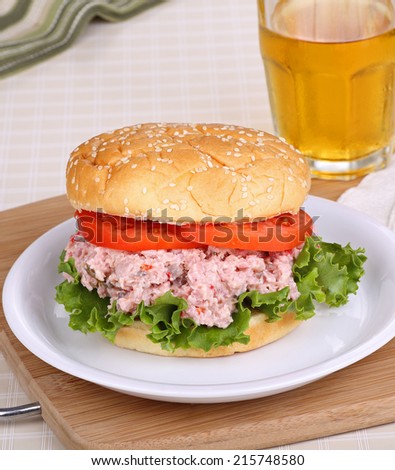 Ham salad on a bun with lettuce and tomato