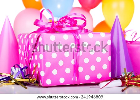 Closeup of a birthday present with decorations