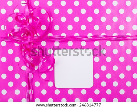 Birthday gift wrap background with a blank note card