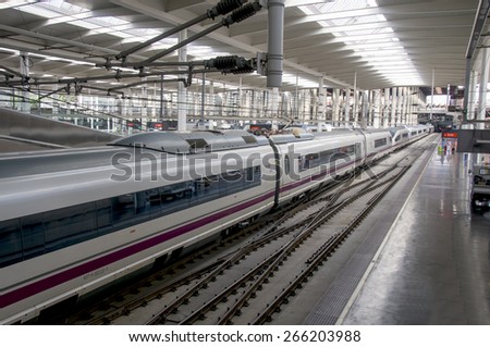 MADRID SPAIN August 31: High speed train in Atocha Station on August 31, 2014 in Madrid, Spain. Spain\'s main cities are connected by high-speed trains.