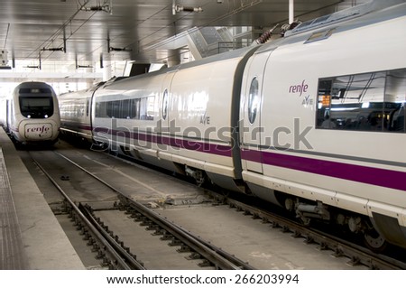 MADRID SPAIN August 31: High speed train in Atocha Station on August 31, 2014 in Madrid, Spain. Spain\'s main cities are connected by high-speed trains.