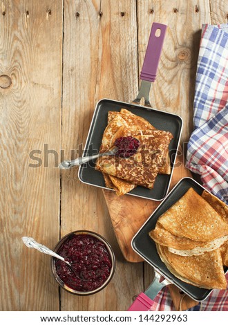 Crepes with black currant jam