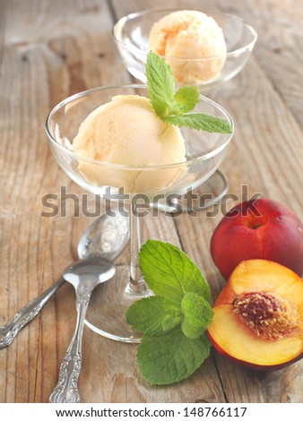 Peach (nectarine) ice cream. Selective focus