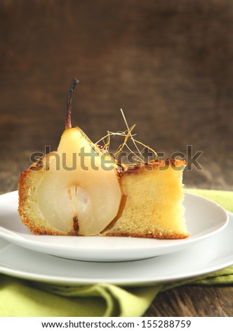 Piece of cake with pears with spun sugar strands