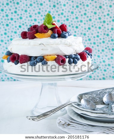 Meringue cake with fresh berries. Pavlova cake