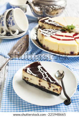 Piece of white and dark chocolate cheesecake