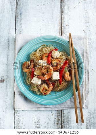 Delicious rice noodles with garlic shrimp and tofu