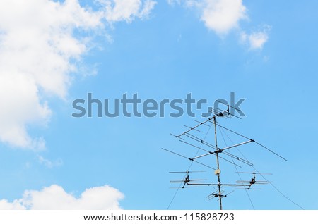 sky background with old tv antenna