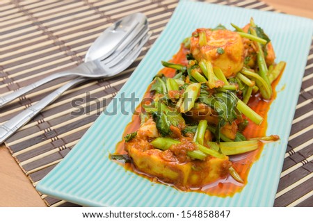 Fried Tofu with chinese kale in red curry sauce