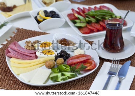 Rich And Delicious Turkish Breakfast On White Wood Table