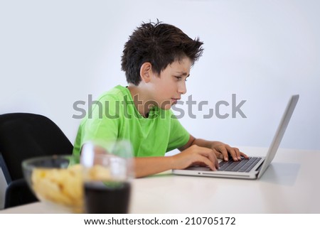 Game illness young boy is playing game on computer