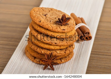 A stack of Chocolate Chip Cookies and cinnamon