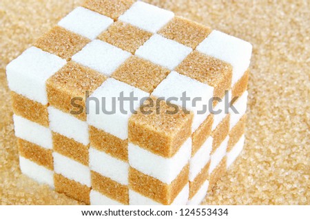 Cube of brown and white sugar cubes