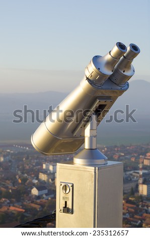 coin operated high powered binoculars on a hill