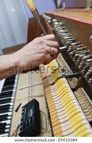 Detailed view of Upright Piano during a tuning. Please see my other photos of a piano being tuned: