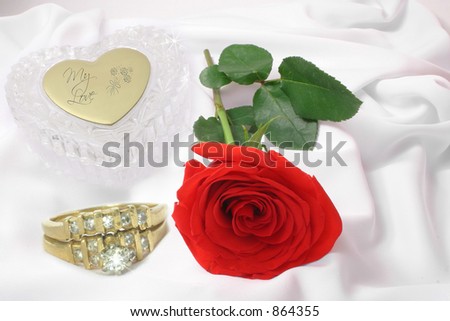 Red Rose, Wedding Rings and Crystal Heart