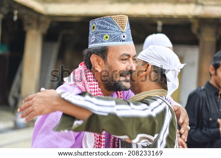 AHMEDABAD, GUJARAT/INDIA - 29TH AUGUST 2014 : Muslims celebrating Eid al-Fitr which marks the end of the month of Ramadan, in Jama Masjid,Ahmedabad, India.