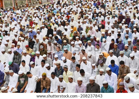 AHMEDABAD, GUJARAT/INDIA - 29TH TUESDAY JULY 2014 : Muslims celebrating Eid al-Fitr which marks the end of the month of Ramadan, in Jama Masjid,Ahmedabad, India.