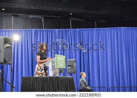 CHICAGO, ILLINOIS/ USA - 7th OCTOBER 2014 : First lady Michelle Obama delivers a speech at the UIC Pavilion, Chicago, USA