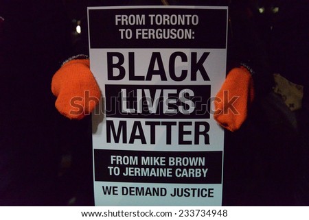 TORONTO, ONTARIO/CANADA - 25th Tuesday November  2014 : Toronto\'s Black Community takes action in solidarity with Ferguson protesters in Toronto, Canada.