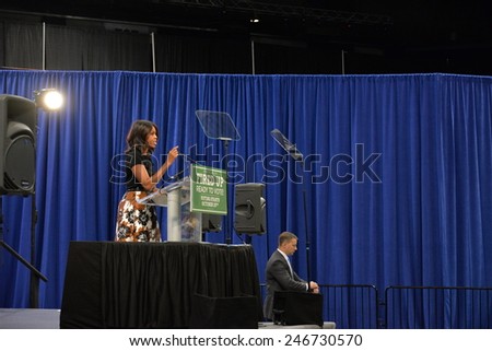 CHICAGO, ILLINOIS/ USA - 7th TUESDAY OCTOBER 2014 : First lady Michelle Obama delivers a speech at the UIC Pavilion calling for voter support for Illinois Gov. Pat Quinn in the upcoming election.