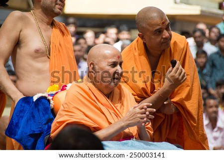AHMEDABAD, GUJARAT/INDIA - March 3rd Sunday 2013 : Pramukh Swami Maharaj comes in public to meet the devotees of Swami Narayan in shahibaug temple, in Ahmedabad,India.
