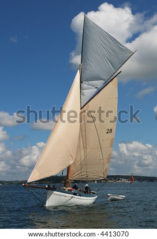 A classic sailing yacht in full sail