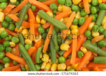 Closeup of mixed vegetables carrots, peas, sweet corn and green beans