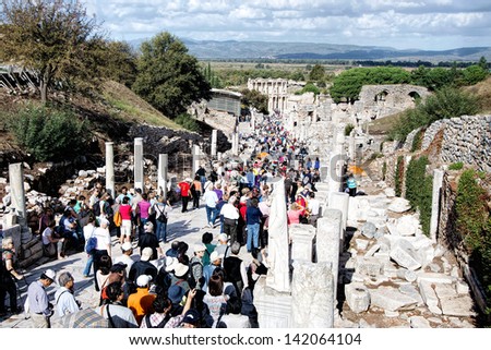 SELCUK, TURKEY - OCT 30: Tourists visit the archaeological ruins of the Ionian city of Ephesus, an ancient Greek city founded in the 10th century BC. October 30, 2012 Selcuk, Turkey